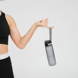 Woman Holding Water Bottle