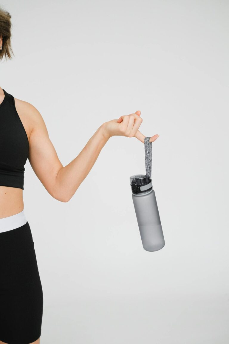 Woman Holding Water Bottle