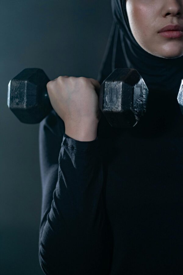 Woman Lifting a Dumbbell